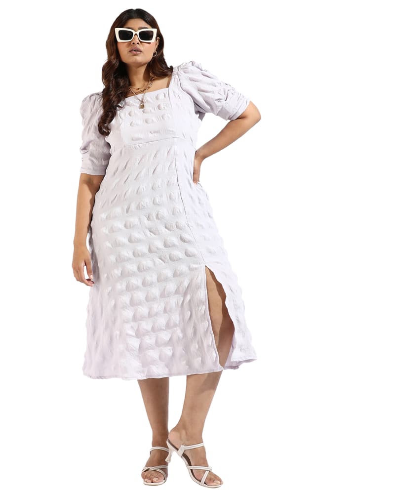 Front of a model wearing a size 3XL Women White Side Slit Dresses in Purple by Instafab Plus. | dia_product_style_image_id:293823